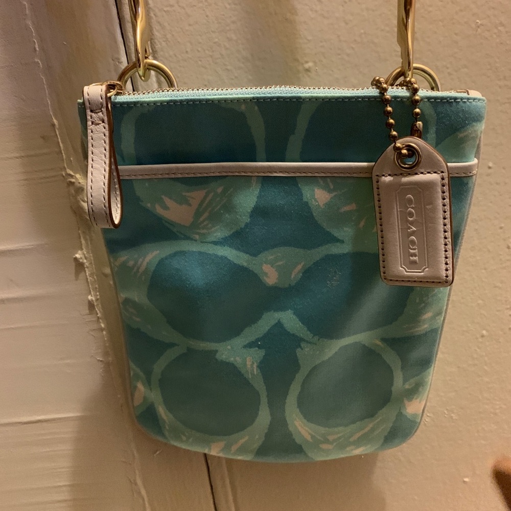 Turquoise Coach logo print white leather detailing